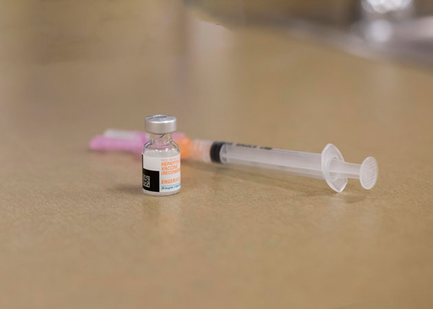 hepatitis b vaccine and syringe